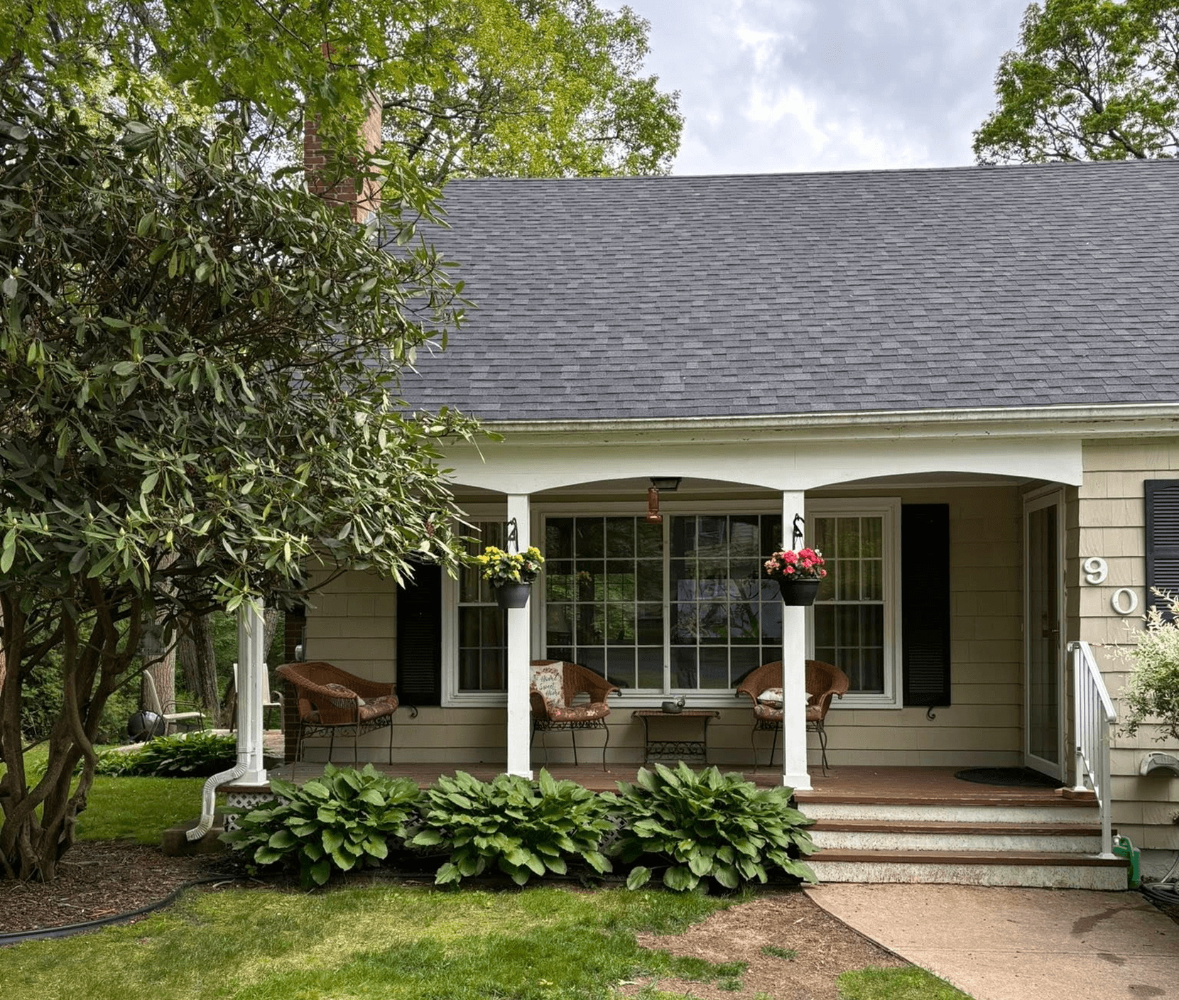 Cozy house with a welcoming front porch.