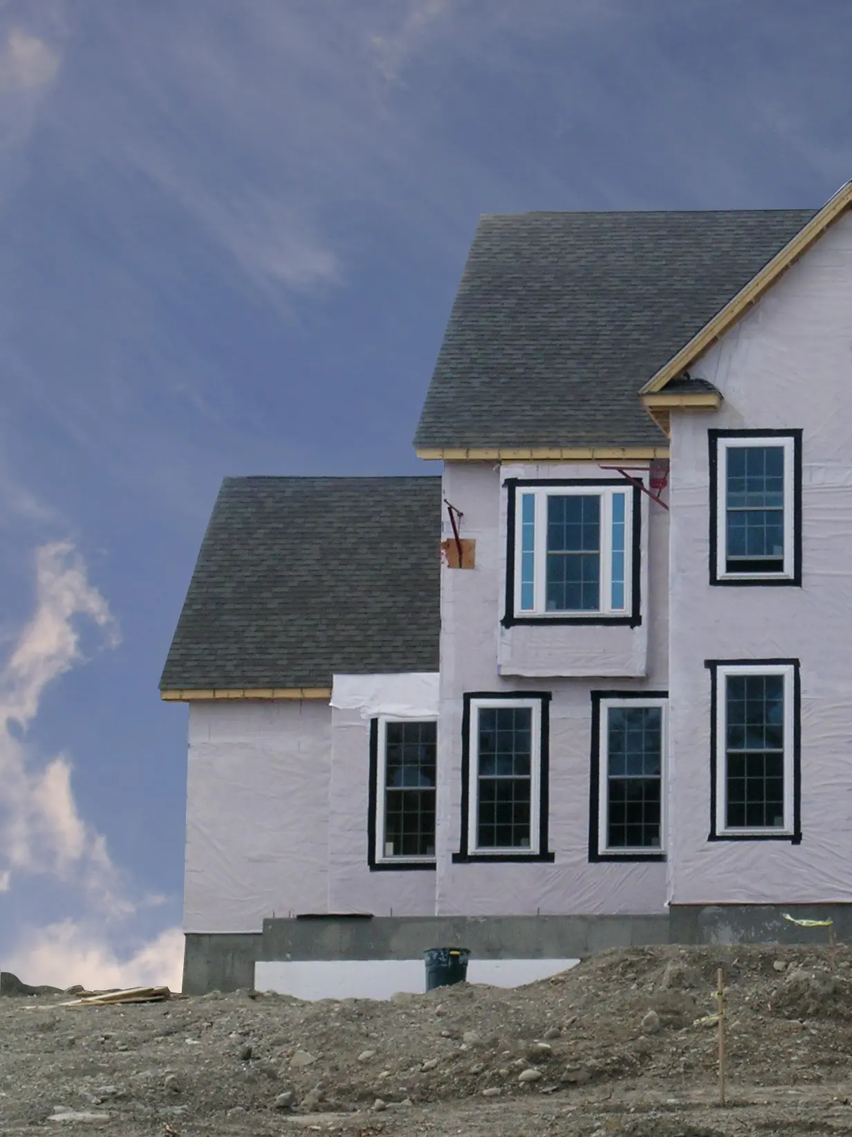 House under construction with blue sky