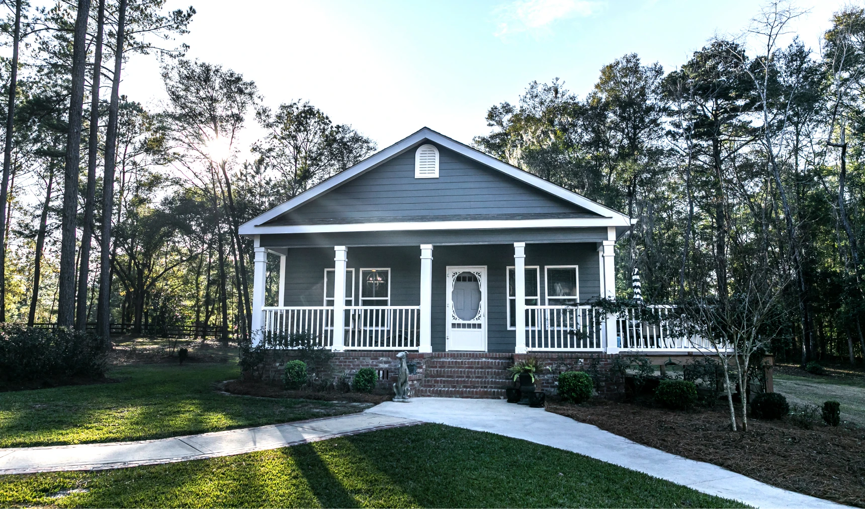 Cozy home with white picket fence.